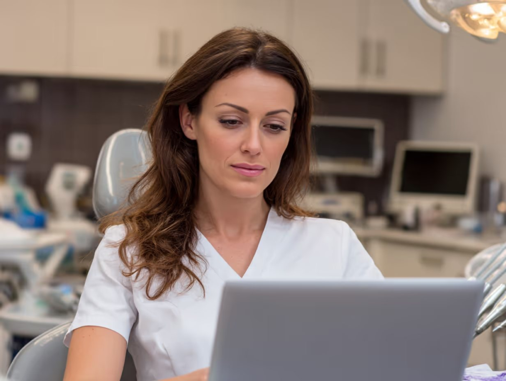 Dental professional working in a modern dental office